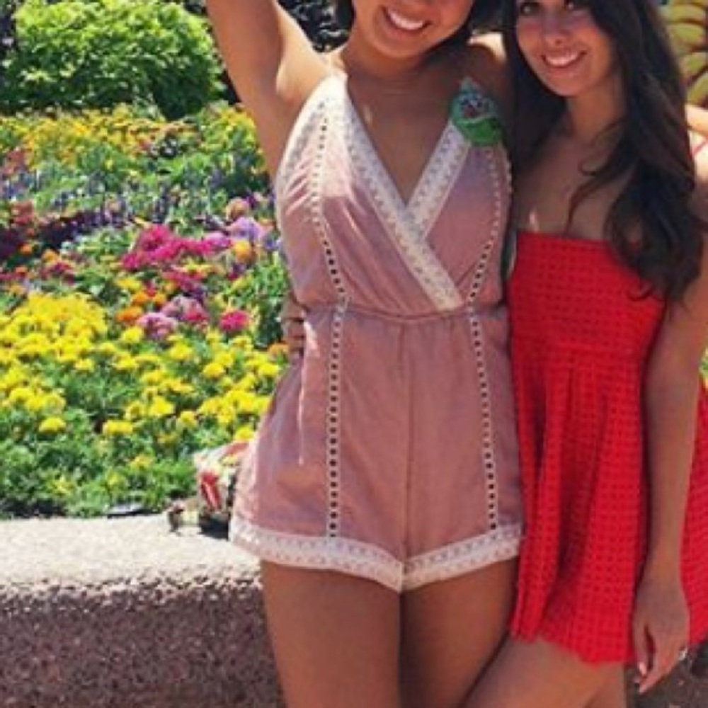 Pink romper with crisscross back